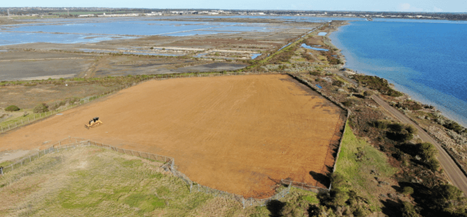 Image of the former landfill site - showing detailed surface finishing works complete and ready for vegetation establishment